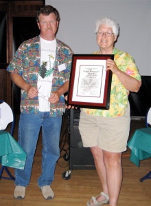 Dan Songster presents Native Perennial Award to Celia Kutcher